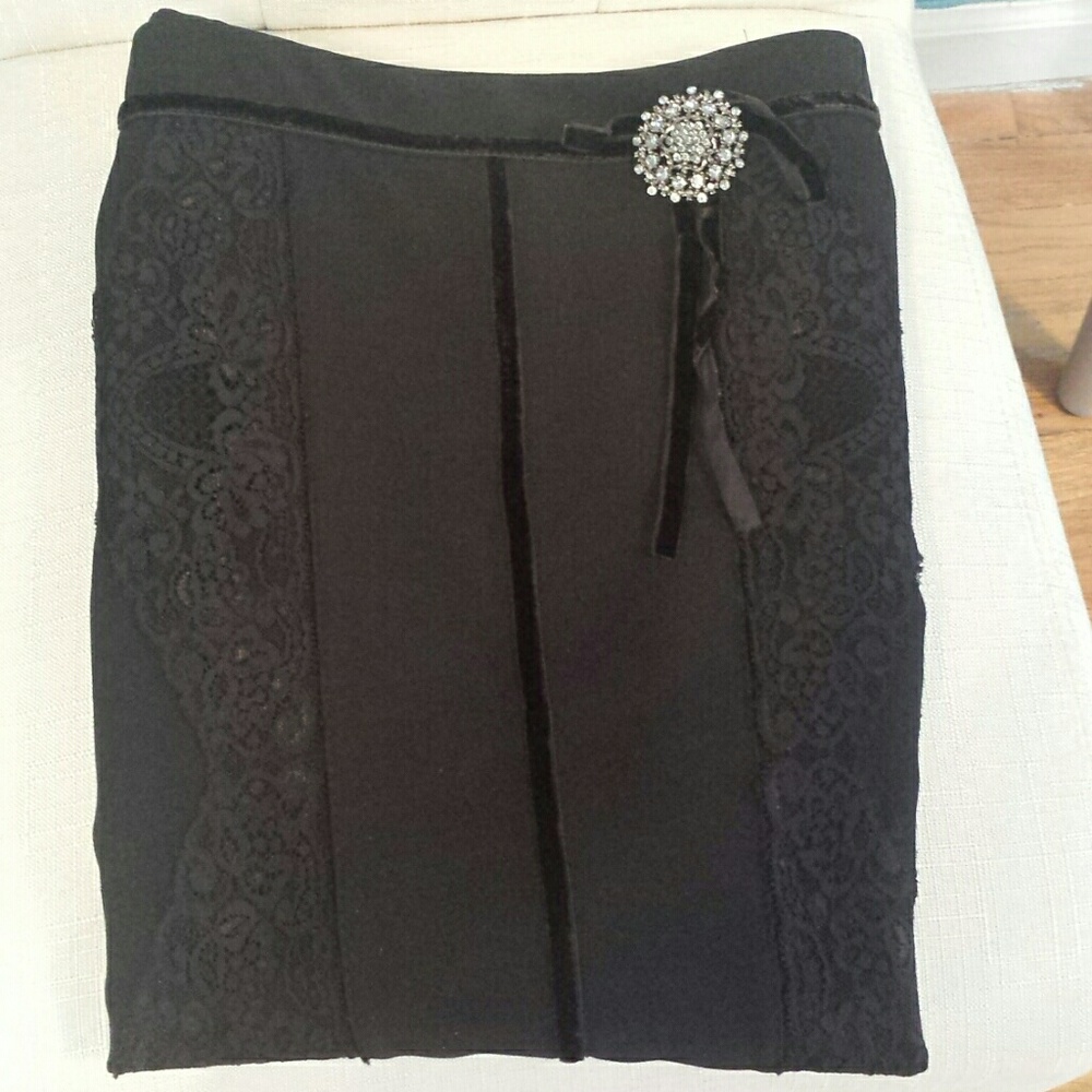 Black pencil skirt with front lack details