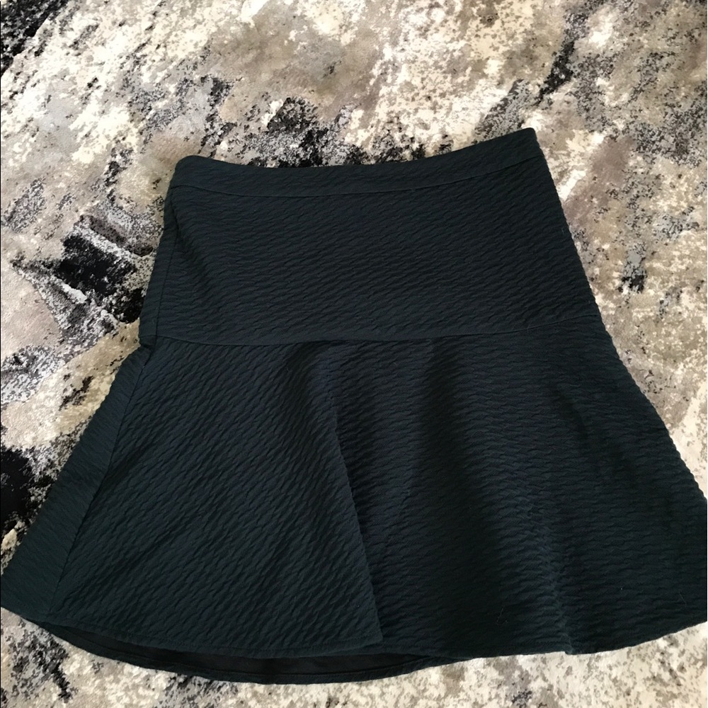 Loft mini skirt. Deep green with hide strip