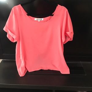 Pink t-shirt blouse with beaded slit-back