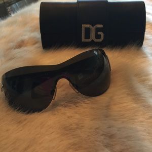 Dolce and Gabbana wrap style sunglasses.