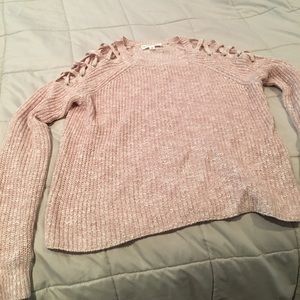 Sweater with open criss-cross shoulder