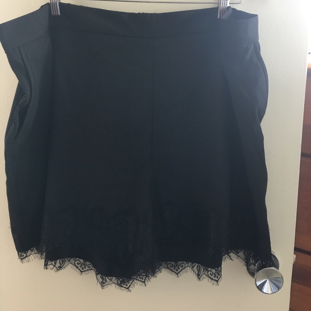 Black laced trim shorts. *NEVER WORN*