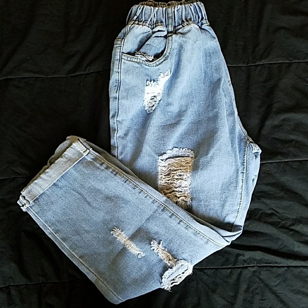 Distressed blue jeans