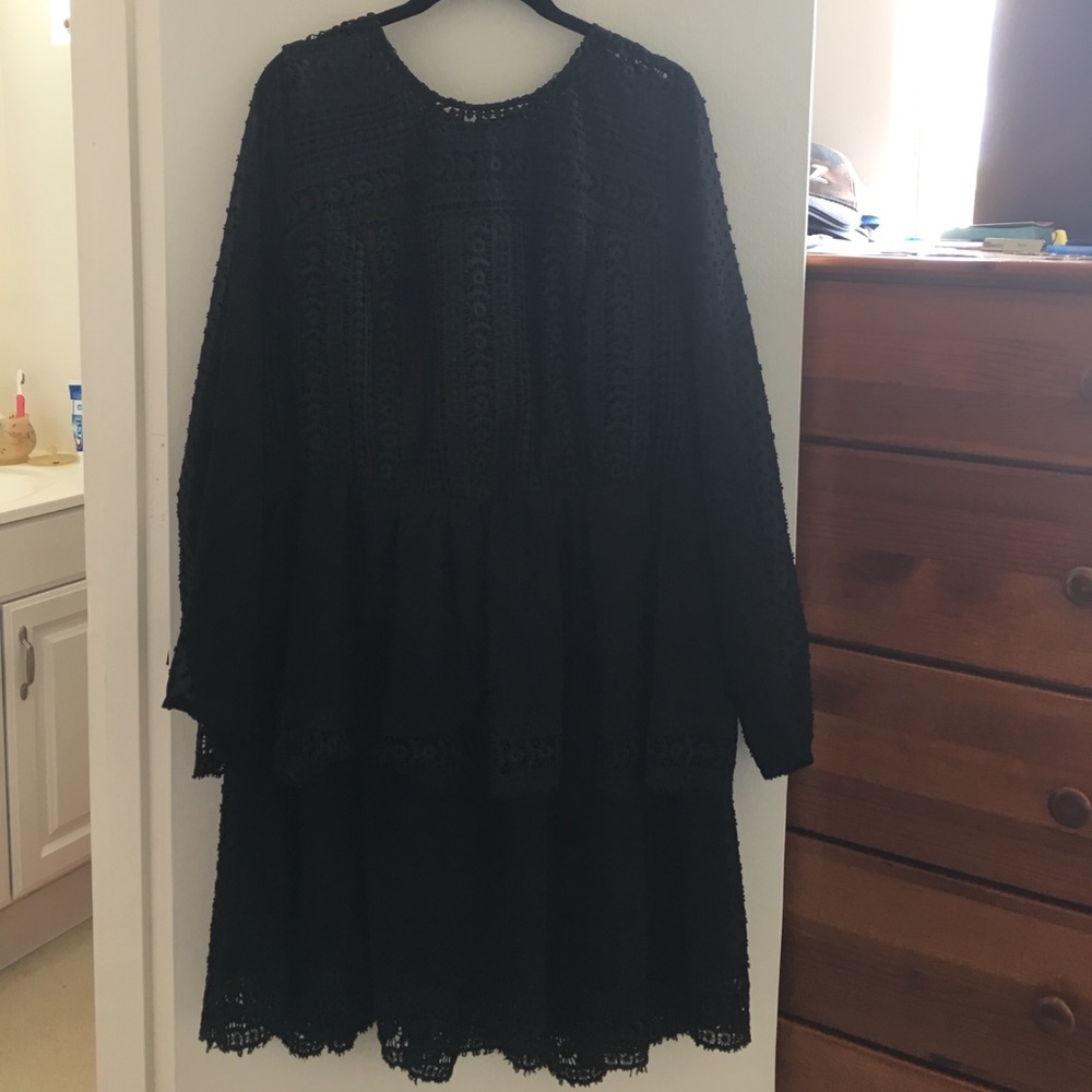 Long sleeved tiered dress.