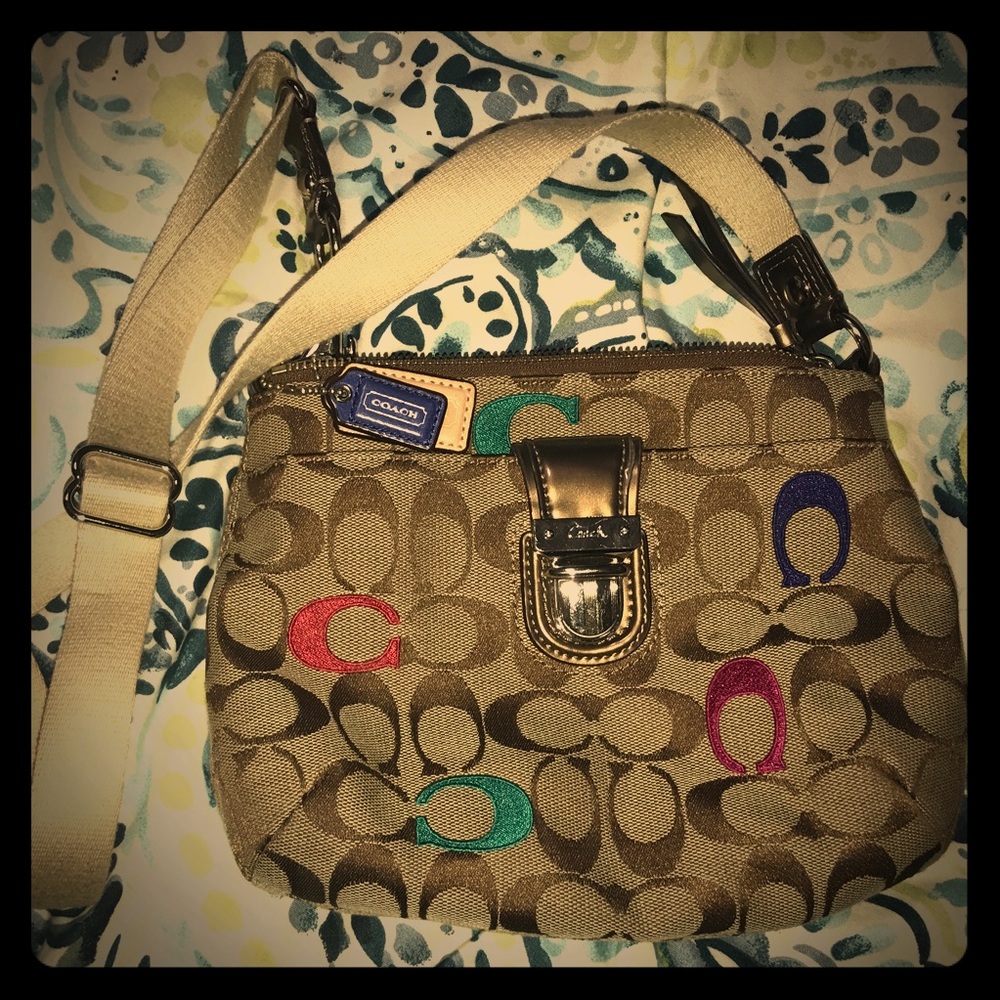 Small brown cross body Coach Purse