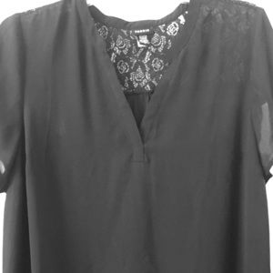 Torrid shirt sleeve blouse with lace detailing.