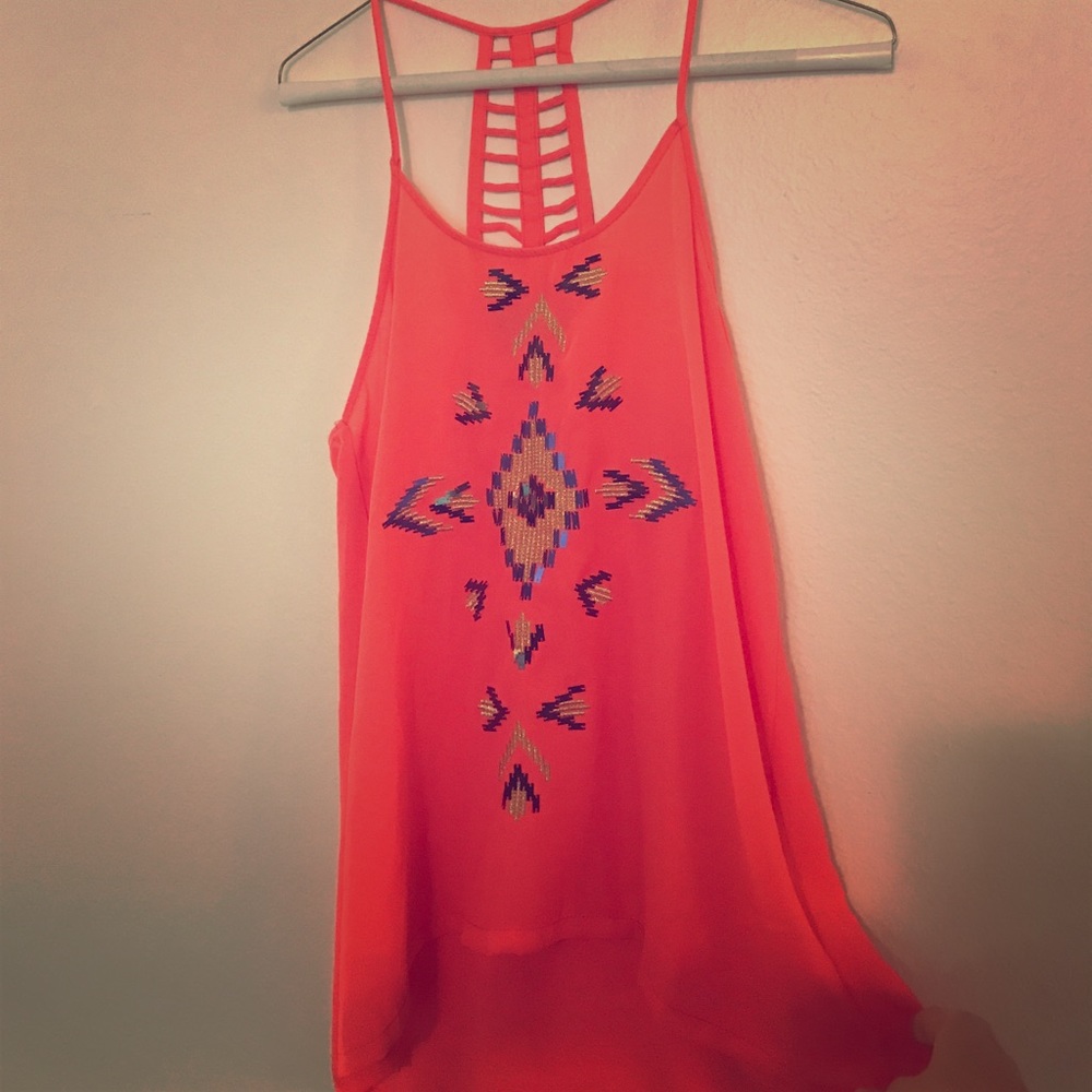 Embellished tank