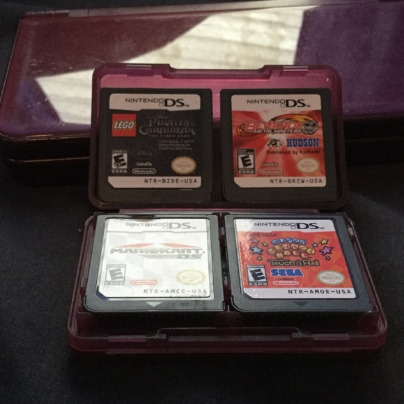 A ds ixl with 4 games and a charger - Picture 2 of 2