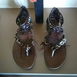 Brown feathered animal print thong sandle.