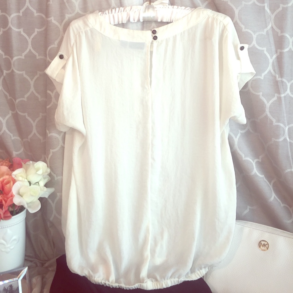 Women's a.n.a polyester cream colored blouse.