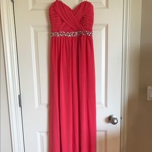 Coral colored prom dress with crisscross back