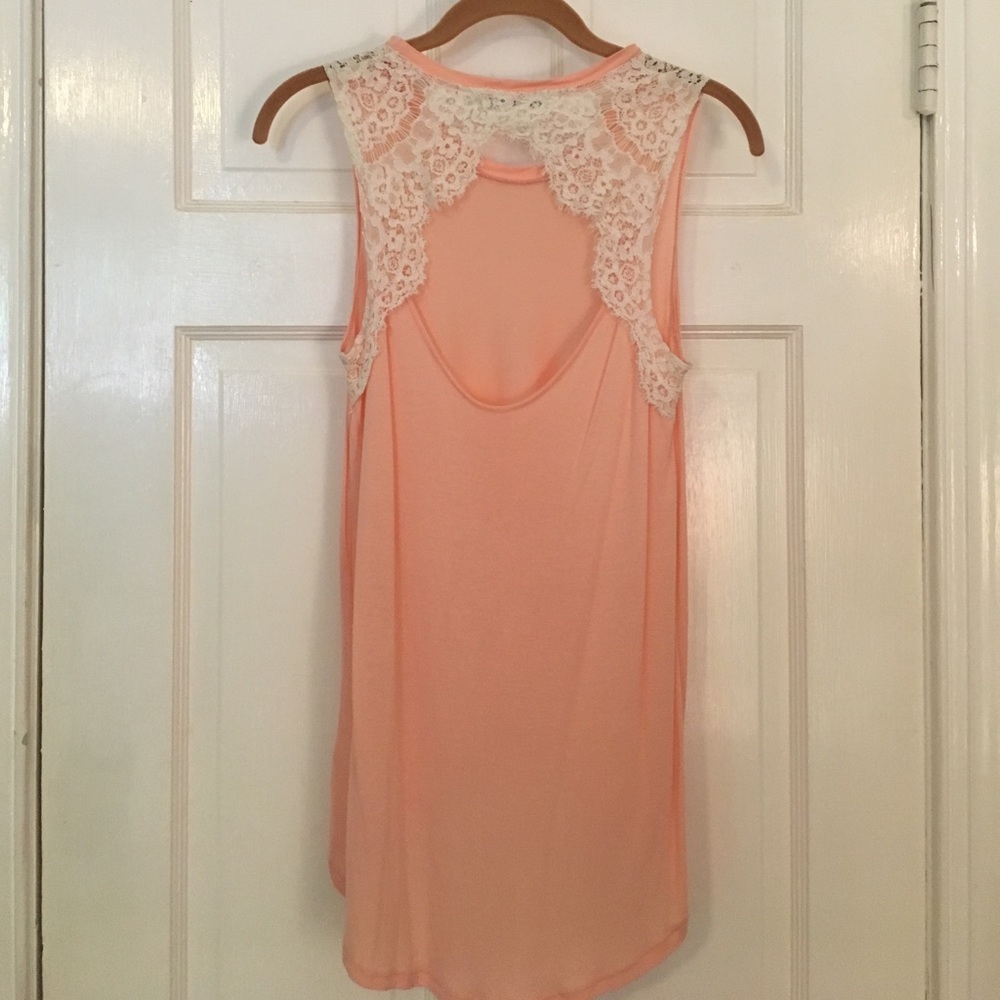 Peach/pink high low sleeveless top w/ lace detail