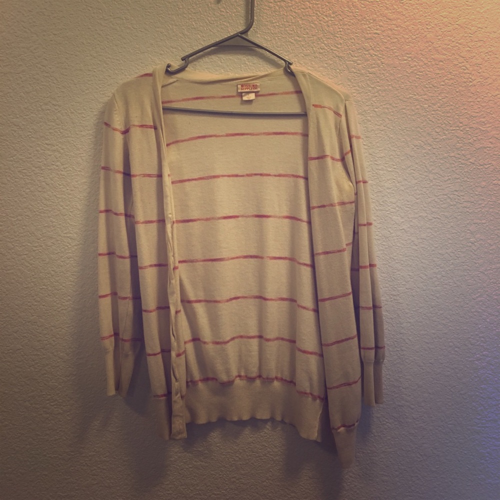 White cardigan with red stripes