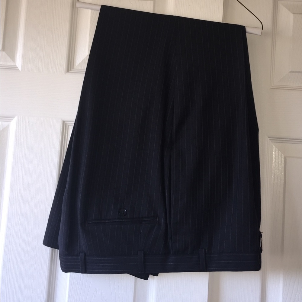 100% wool black Alfani dress pants.