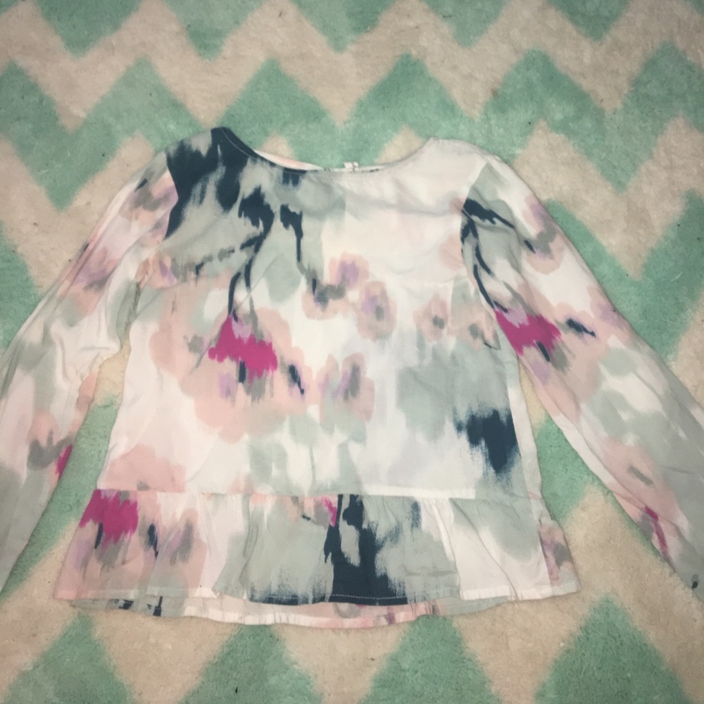A nice watercolor print blouse great with pants