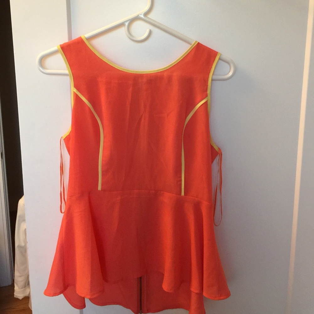 orange and yellow peplum top