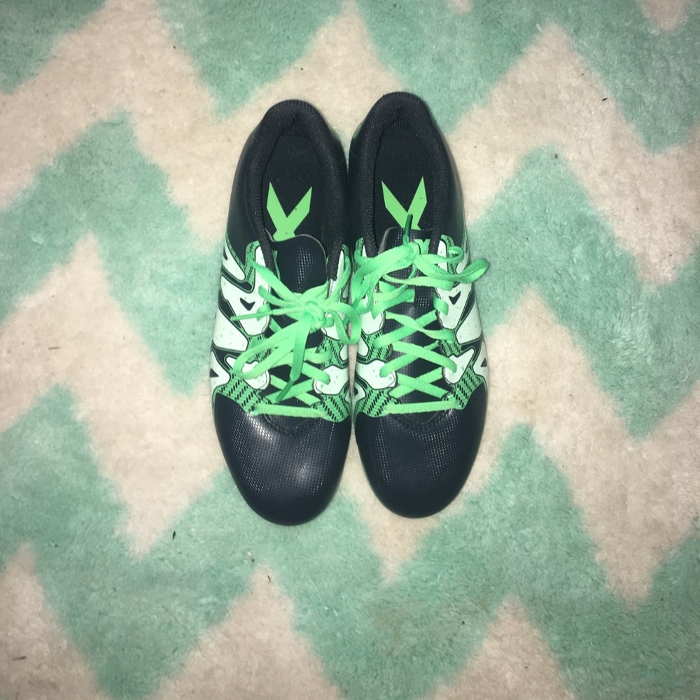 Brand new green and black adidas cleats