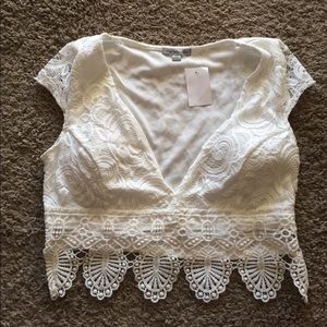 Charlotte Russe lace crop top. Medium