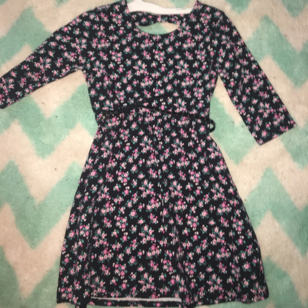 A floral a-line dress with a peak a boo back