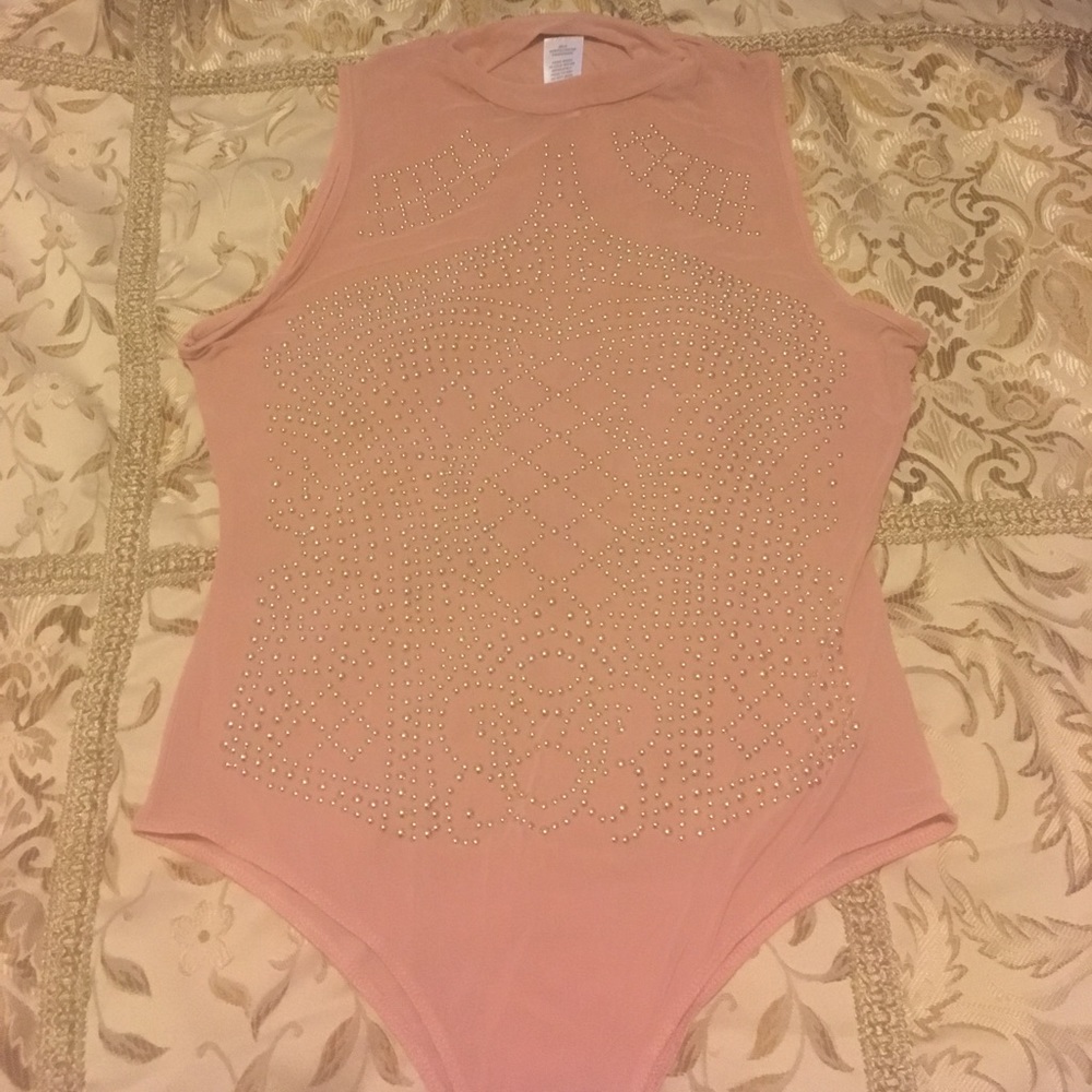 A coral bodysuit