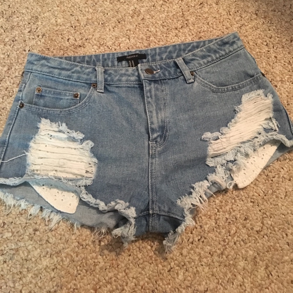 High-wasted ripped shorts.