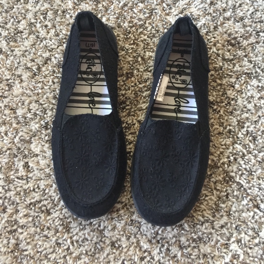 NWOT black slip on shoes
