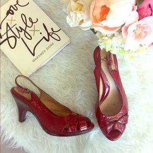 Red strapped kitten heel