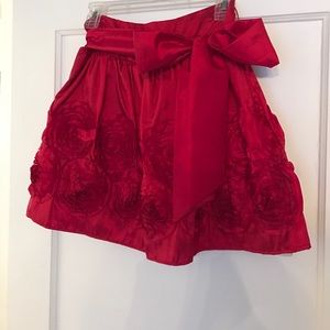 Red skirt with bow
