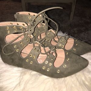 A pair of Ankle flats that are size 7 ,olive green