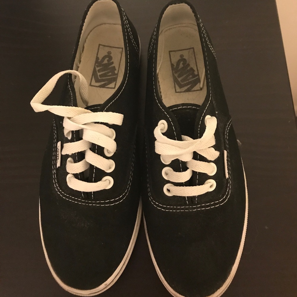 Black Vans sneakers