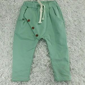 Pale Green buttons jogger pants. Kids
