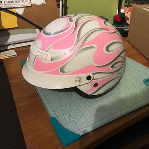 White with pink flames motorcycle helmet