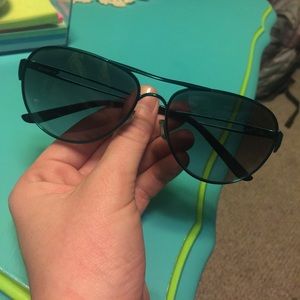 Dark teal women's Oakley sunglasses