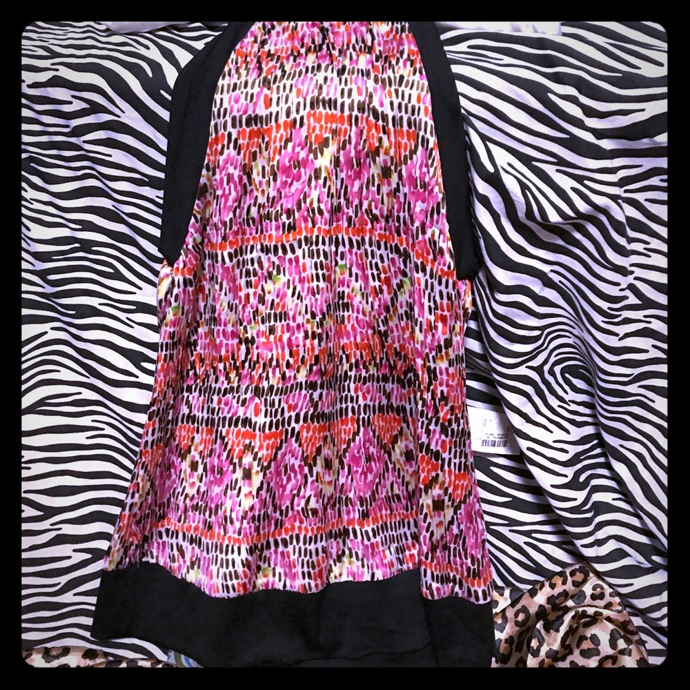 Bright and sleek button neck halter blouse tank.