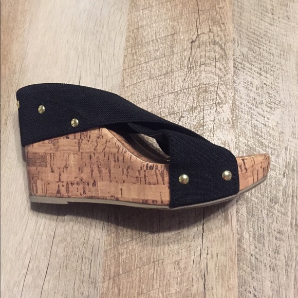 Black and cork platform heels with gold accents. - Picture 1 of 2