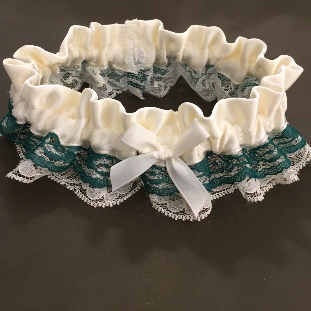 Handmade bridal garter in ivory & green.