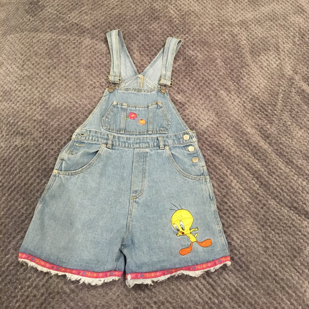 vintage light-wash denim looney toons overalls