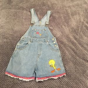 vintage light-wash denim looney toons overalls