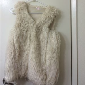 White furry vest!
