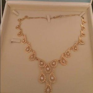 Real gold and diamond necklace never been used