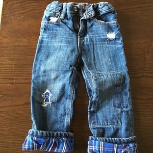 Gap distressed jeans, lined with plaid fabric