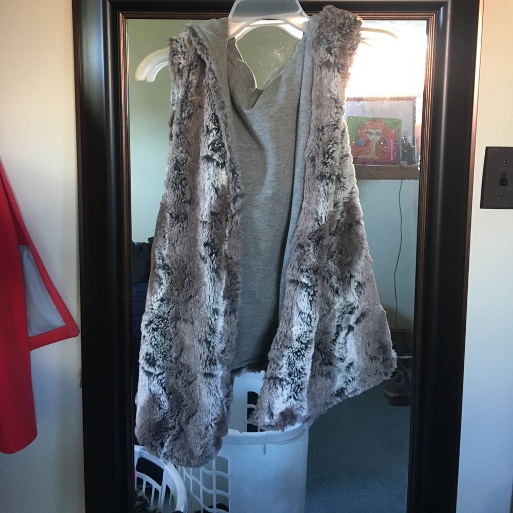 Hooded fur vest