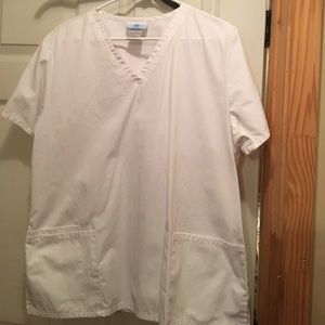 White scrub top with pockets