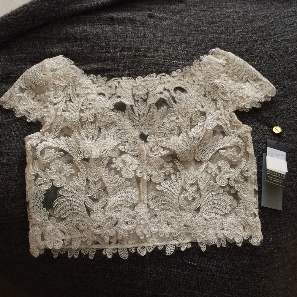 Beautiful cap-sleeve sweetheart lace bridal top.