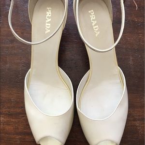 Prada slightly Used heel. Small scuffs on heel