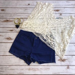 Frayed blue jean shorts