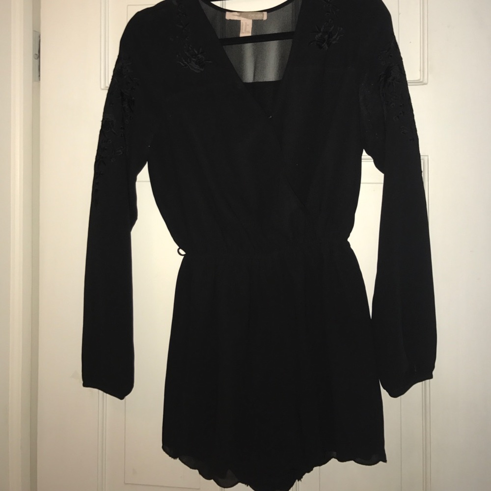 Black surplice top long sleeve romper