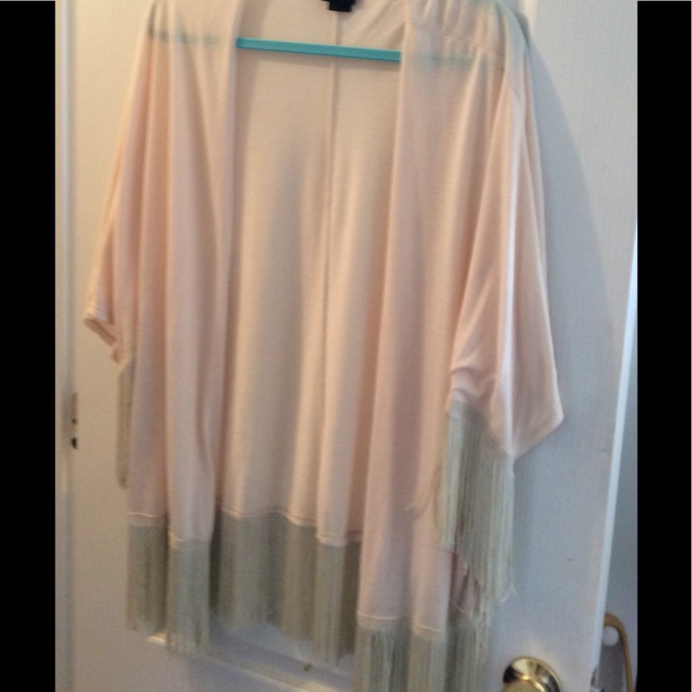 Fringed coverup. Festival and beach perfect.