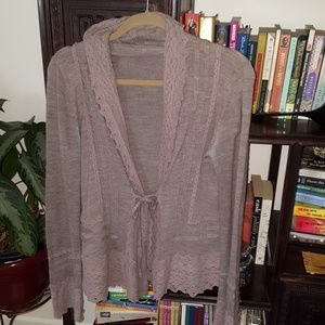 Anthro cardigan with lace details.