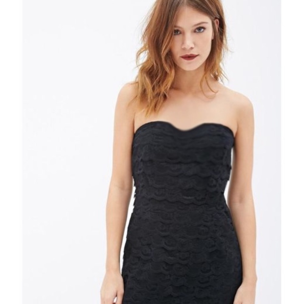 Stunning ruffle mini stress. So flattering! black